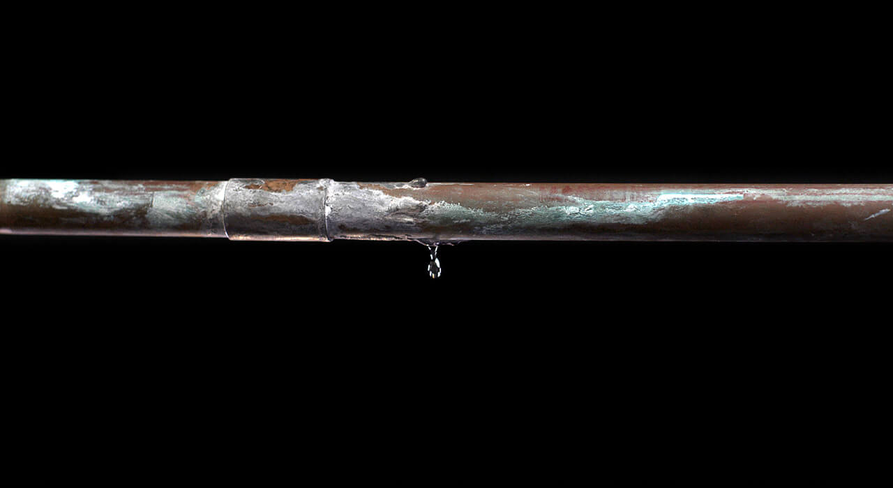 Close-up of dripping pipe joint